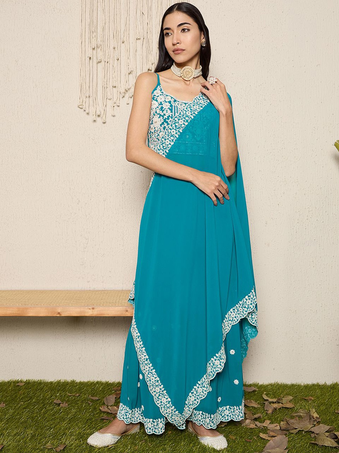 

Anouk Sea Green & White Floral Embroidered Shoulder Straps Top with Sharara & Dupatta