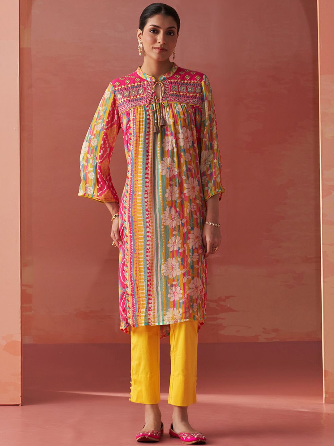 

Lakshita Floral Embroidered Mirror Work Tie-Up Neck A-Line Kurta, Yellow