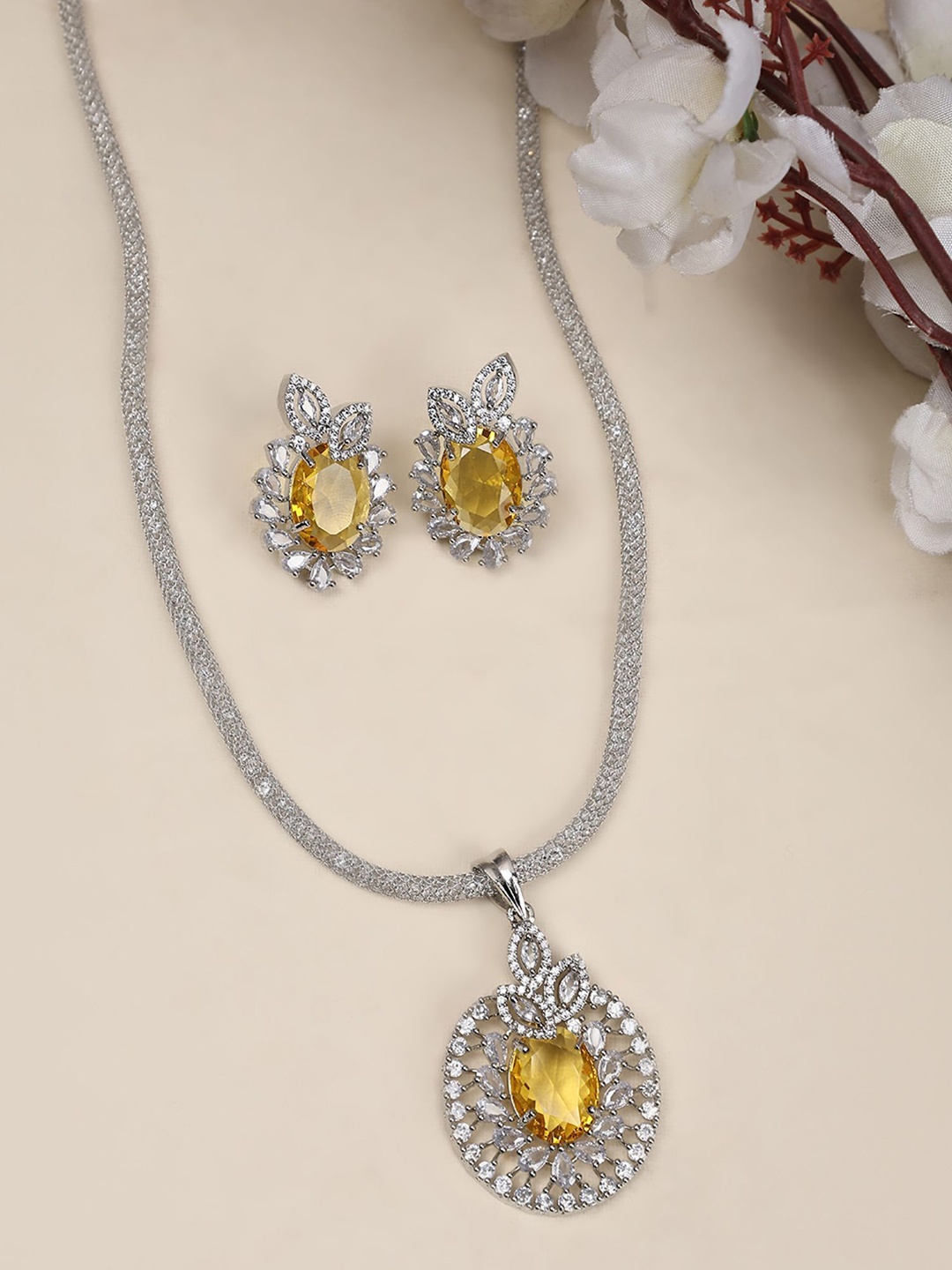 

ANIKAS CREATION Silver-Plated AD Studded Necklace and Earrings