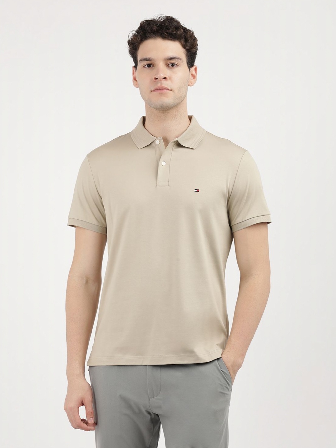 

Tommy Hilfiger Men Solid Polo Collar Cotton T-shirt, Beige