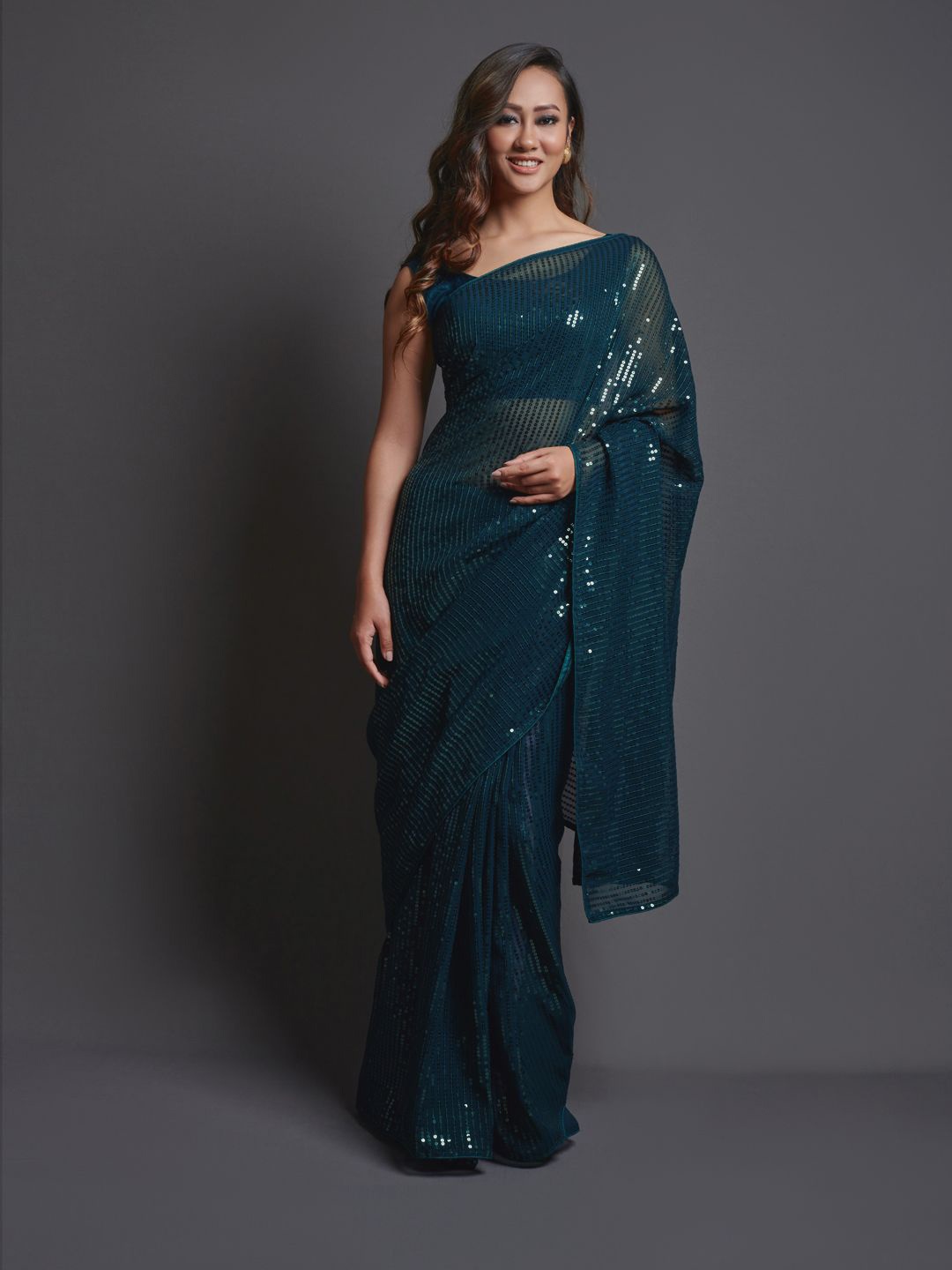 

Krimmple Striped Sequinned Pure Georgette Saree, Blue