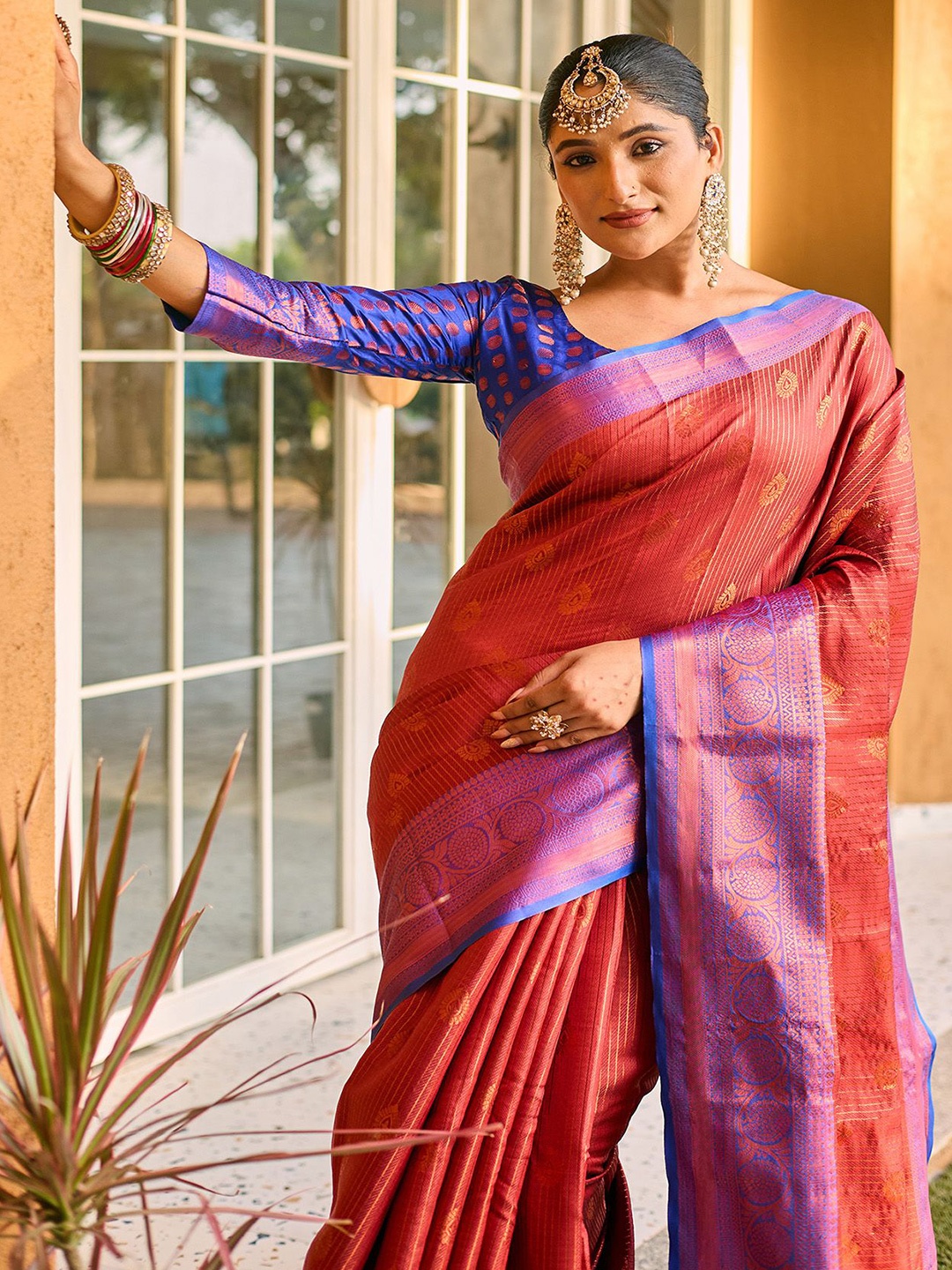 

Anouk Ethnic Motifs Printed Zari Kanjeevaram Saree, Rust