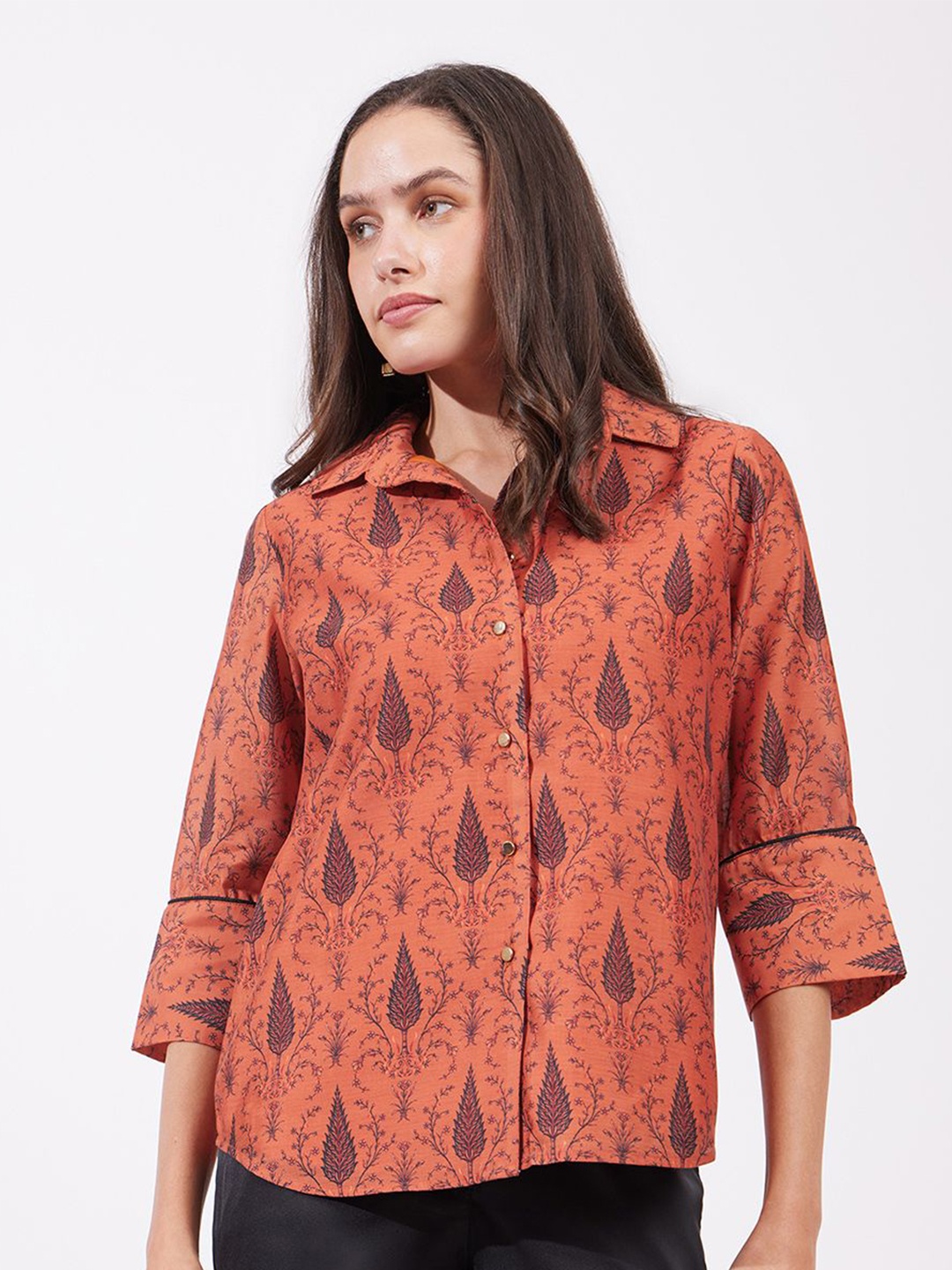 

FableStreet Women Spread Collar Ethnic Motifs Printed Casual Shirt, Rust