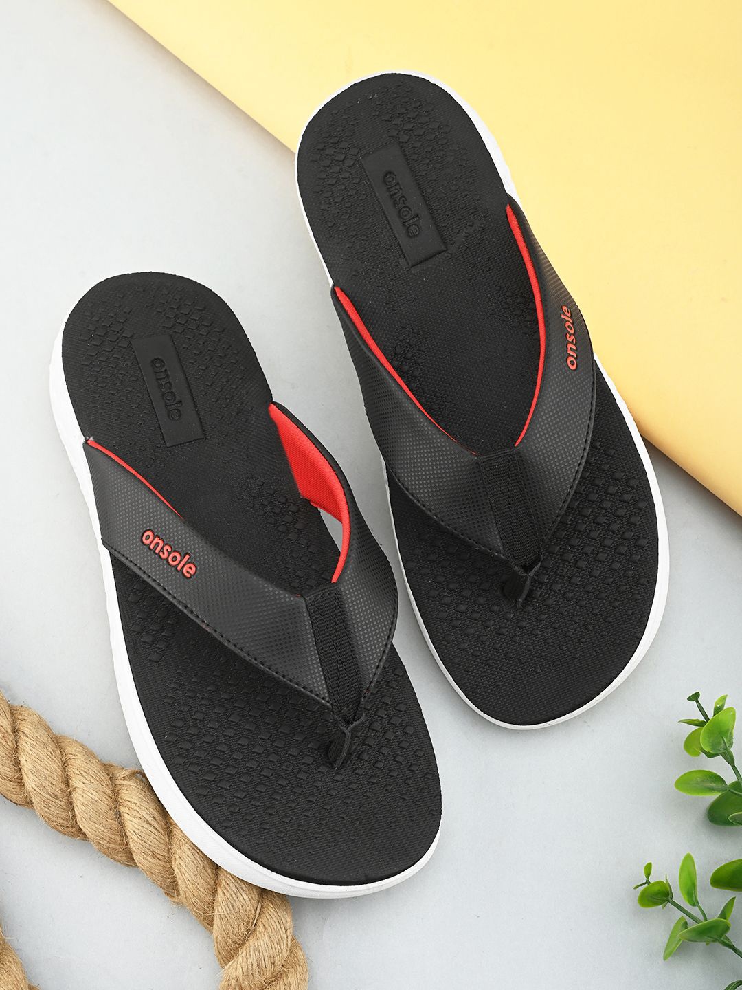 

ONSOLE Men Slip-On Flip Flops, Black