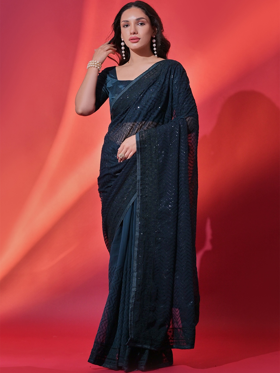 

Krimmple Embroidered Pure Georgette Saree, Blue