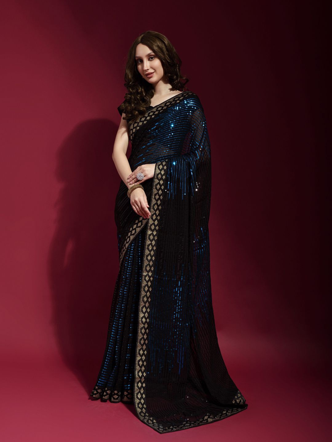 

Krimmple Striped Sequinned Pure Georgette Fusion Saree, Blue