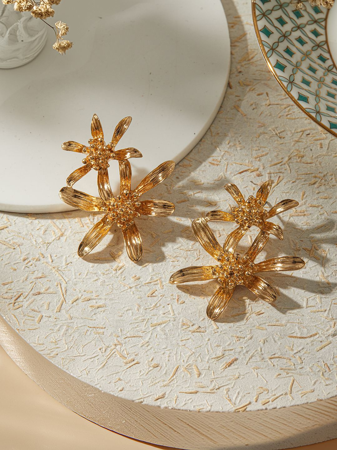 

Jazz and Sizzle Gold Plated Floral Shaped Drop Earrings