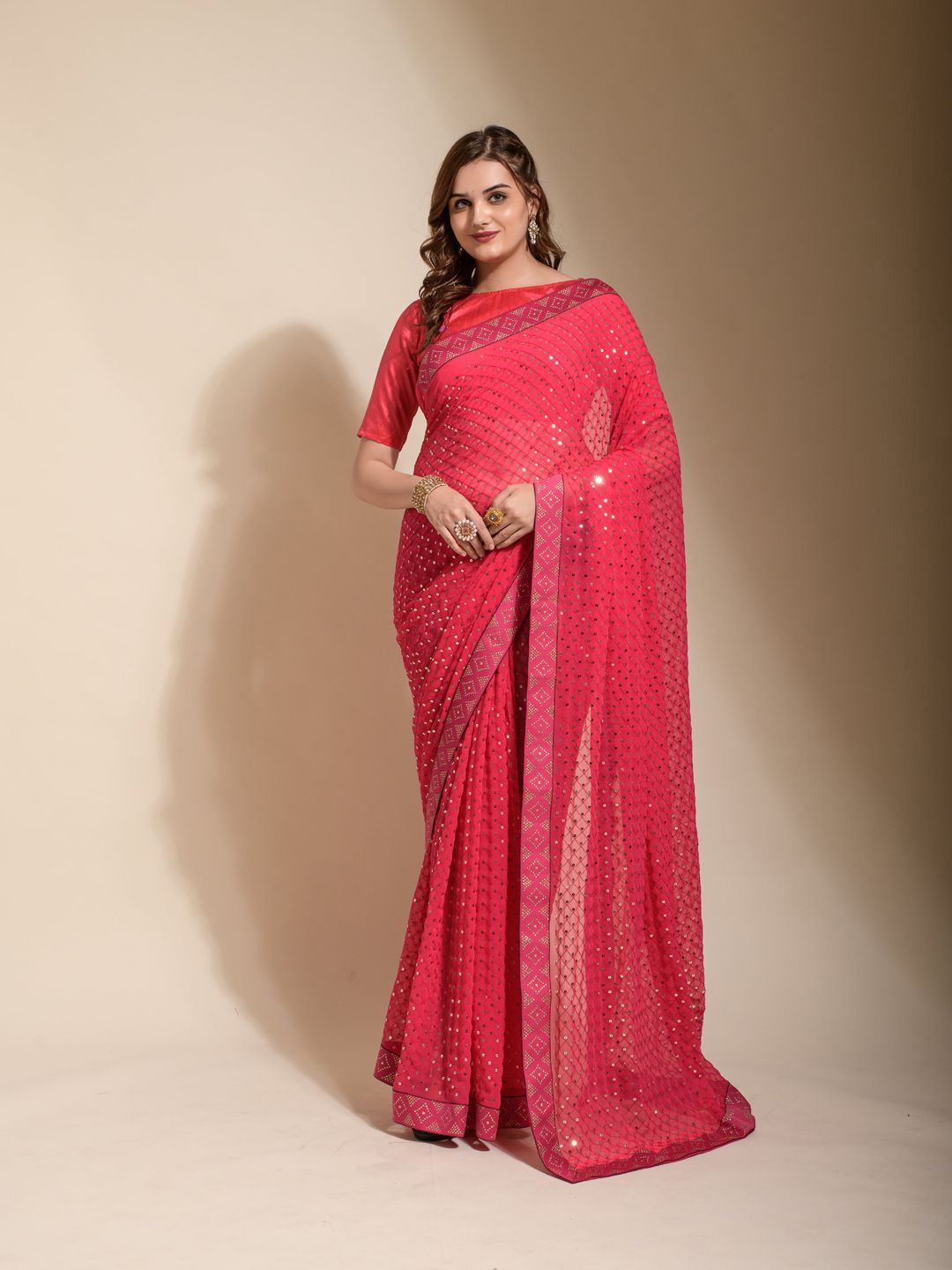 

Krimmple Striped Sequinned Pure Georgette Saree, Pink