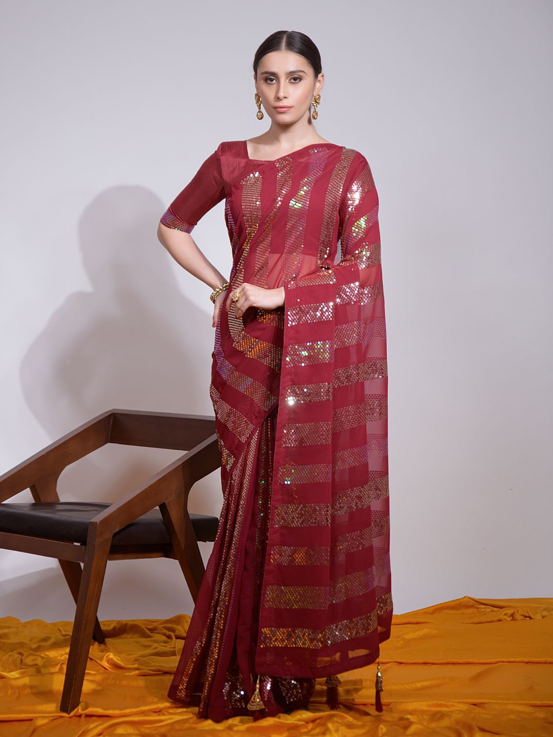 

Krimmple Striped Sequinned Pure Georgette Saree, Maroon