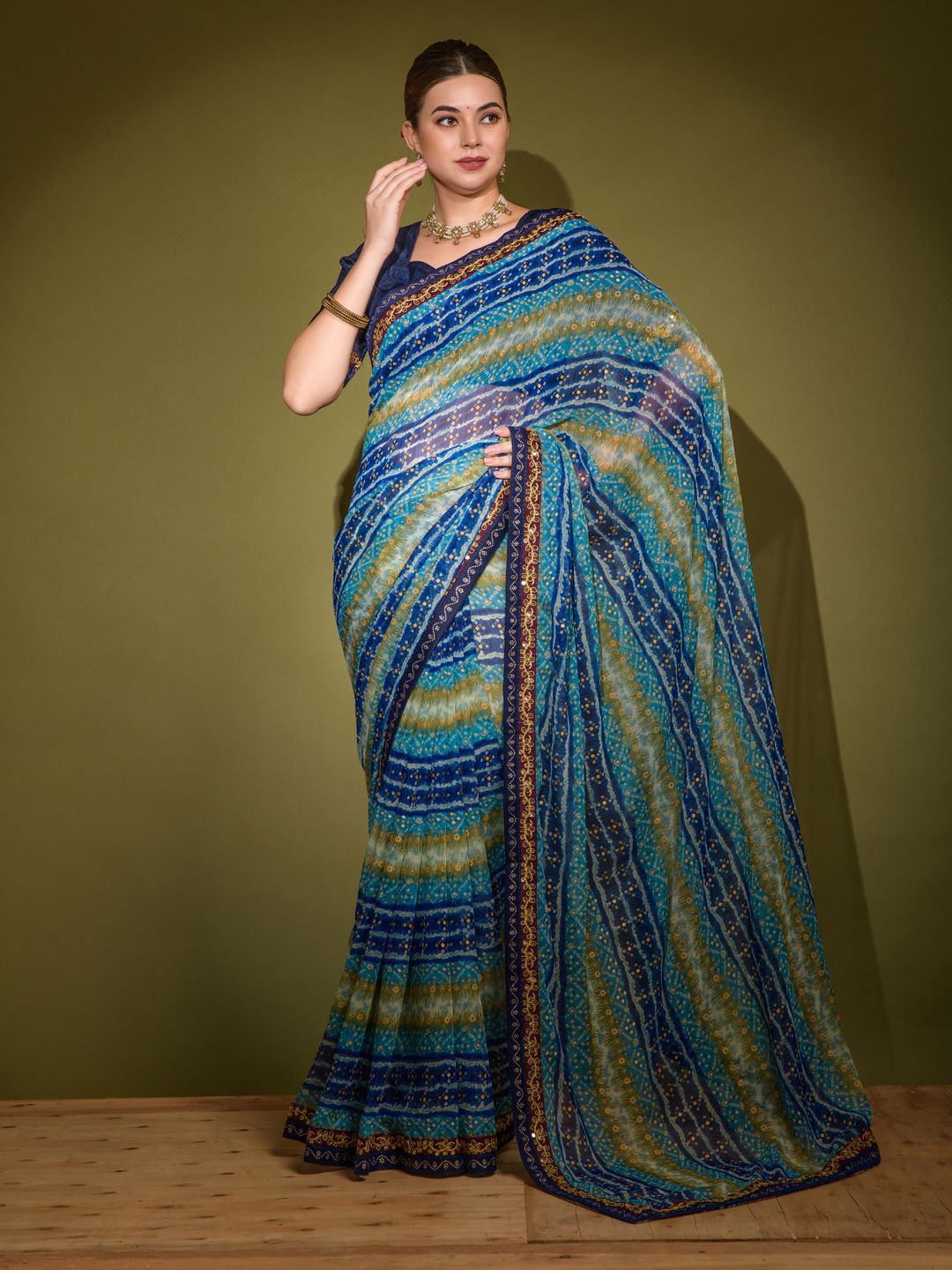 

Krimmple Bandhani Sequinned Pure Georgette Saree, Blue