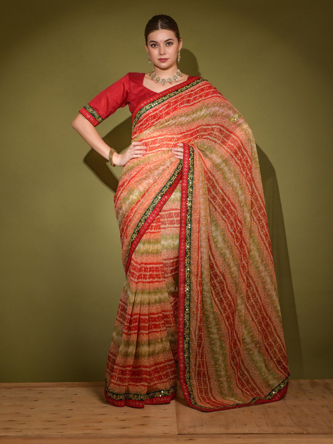 

Krimmple Striped Embroidered Pure Georgette Saree, Red