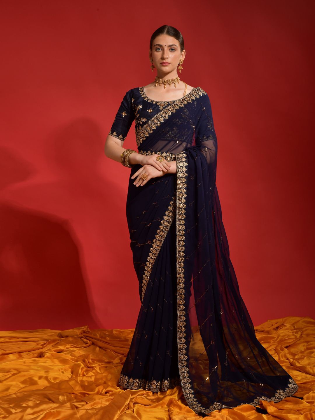 

Krimmple Striped Sequinned Pure Georgette Saree, Navy blue