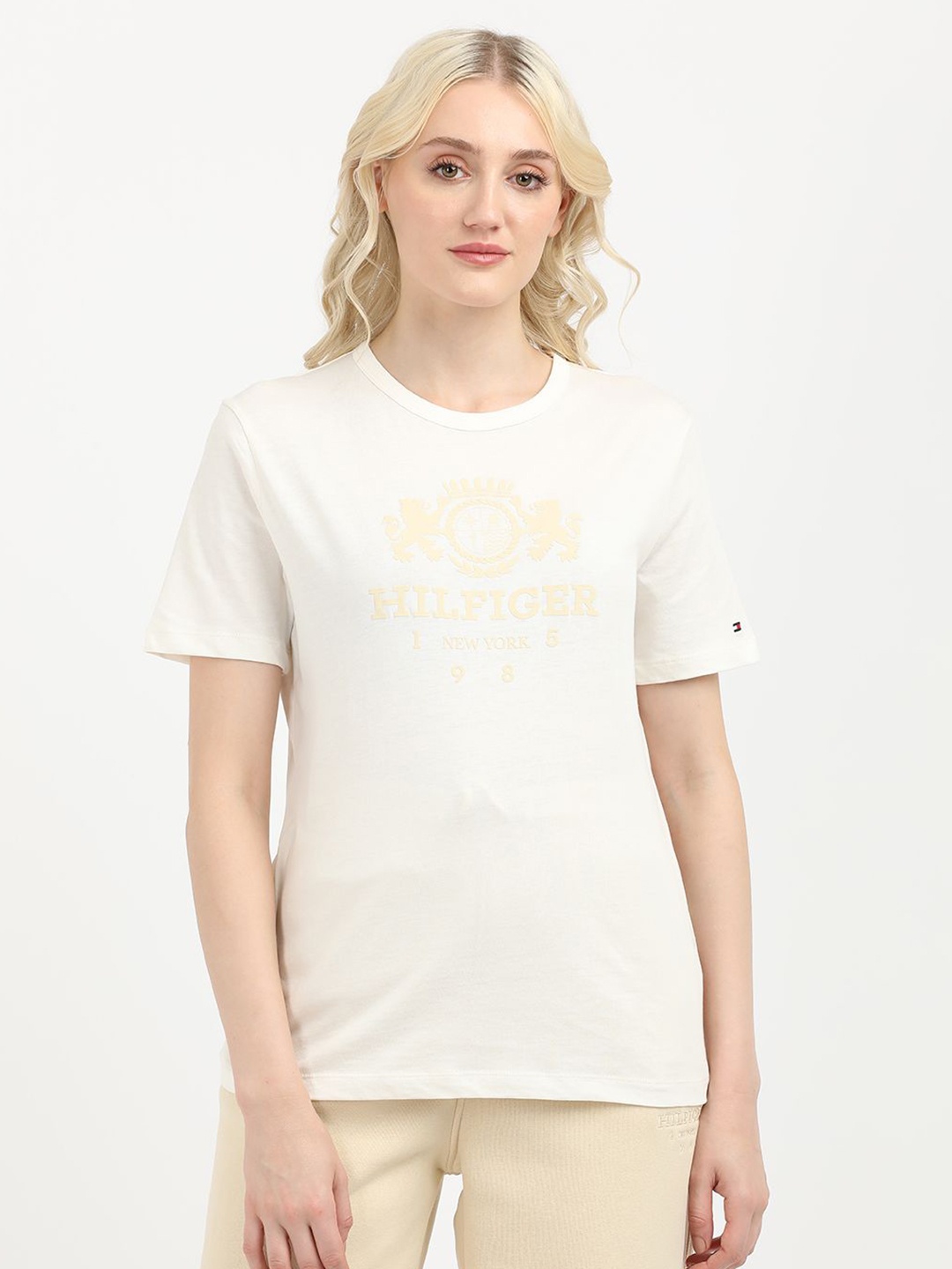 

Tommy Hilfiger Women Brand Logo Printed Round Neck Cotton T-shirt, White