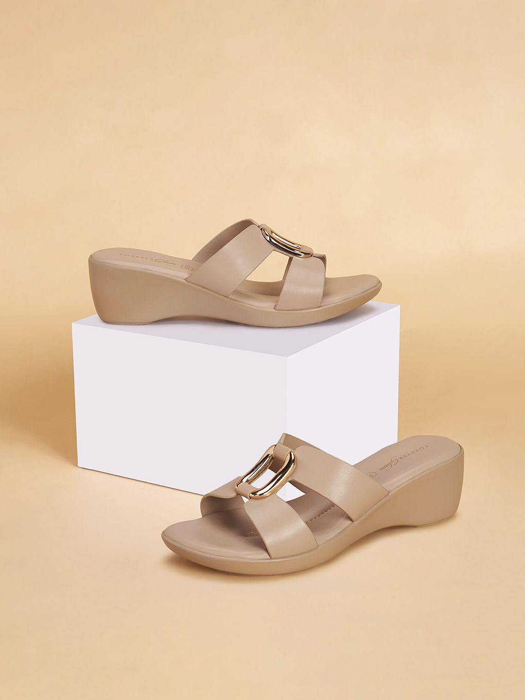 

Forever Glam by Pantaloons Women Slip-On Wedges, Cream