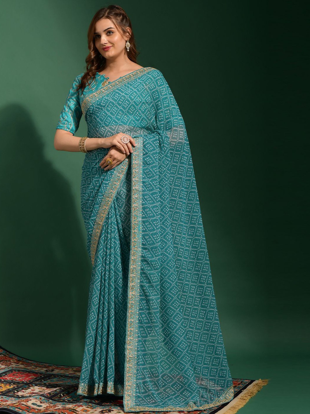 

Krimmple Bandhani Sequinned Pure Georgette Saree, Sea green