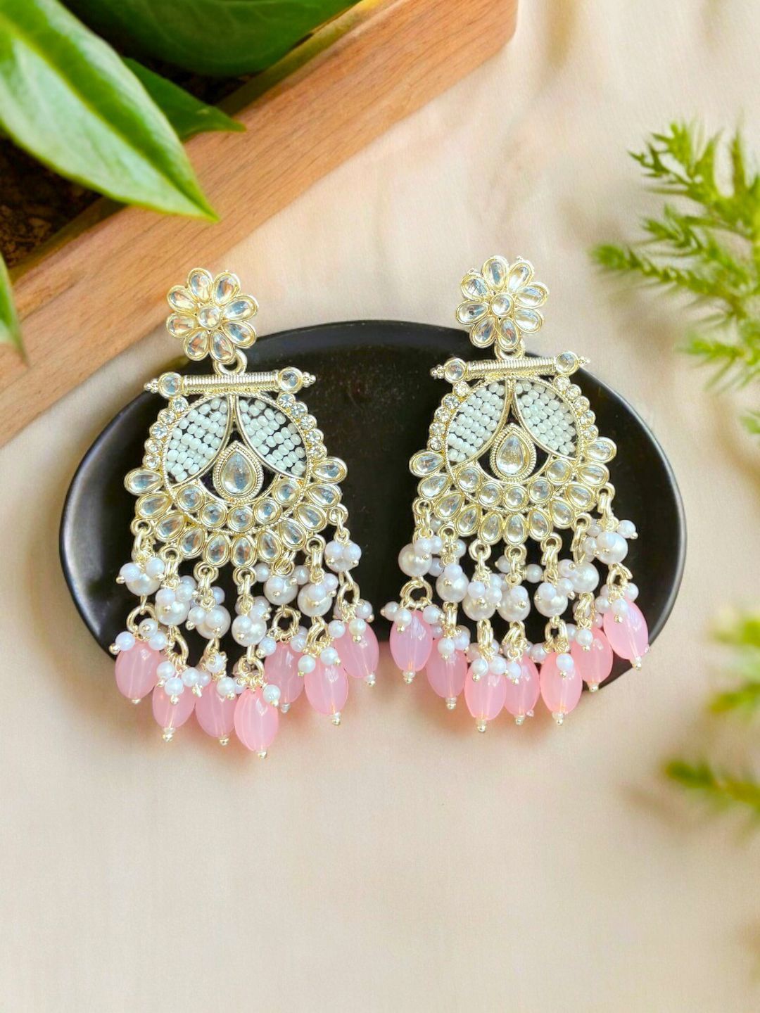 

Anouk Pink Gold Plated Kundan Floral Chandbalis