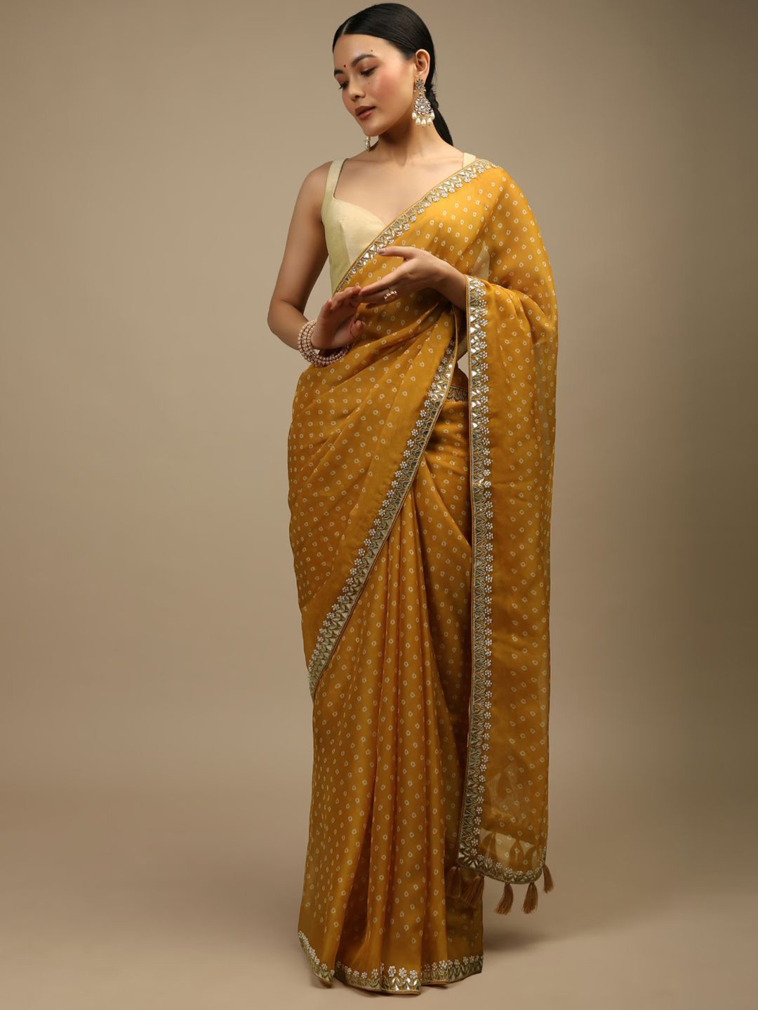 

Krimmple Bandhani Beads and Stones Pure Cotton Saree, Mustard