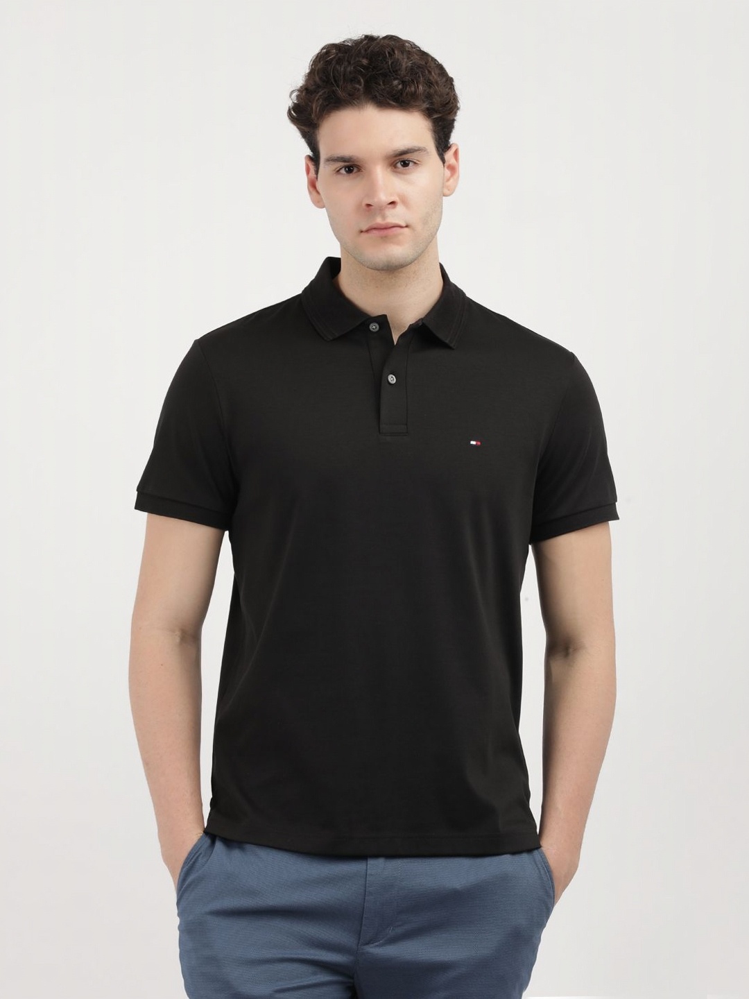 

Tommy Hilfiger Men Solid Polo Collar Cotton T-shirt, Black