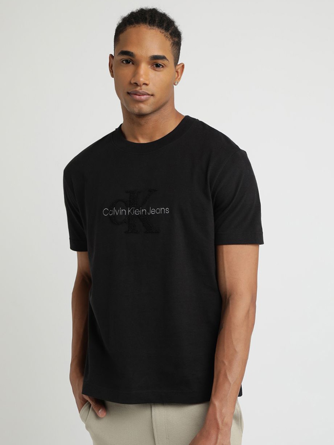 

Calvin Klein Jeans Men Typography Printed Round Neck Cotton T-shirt, Black