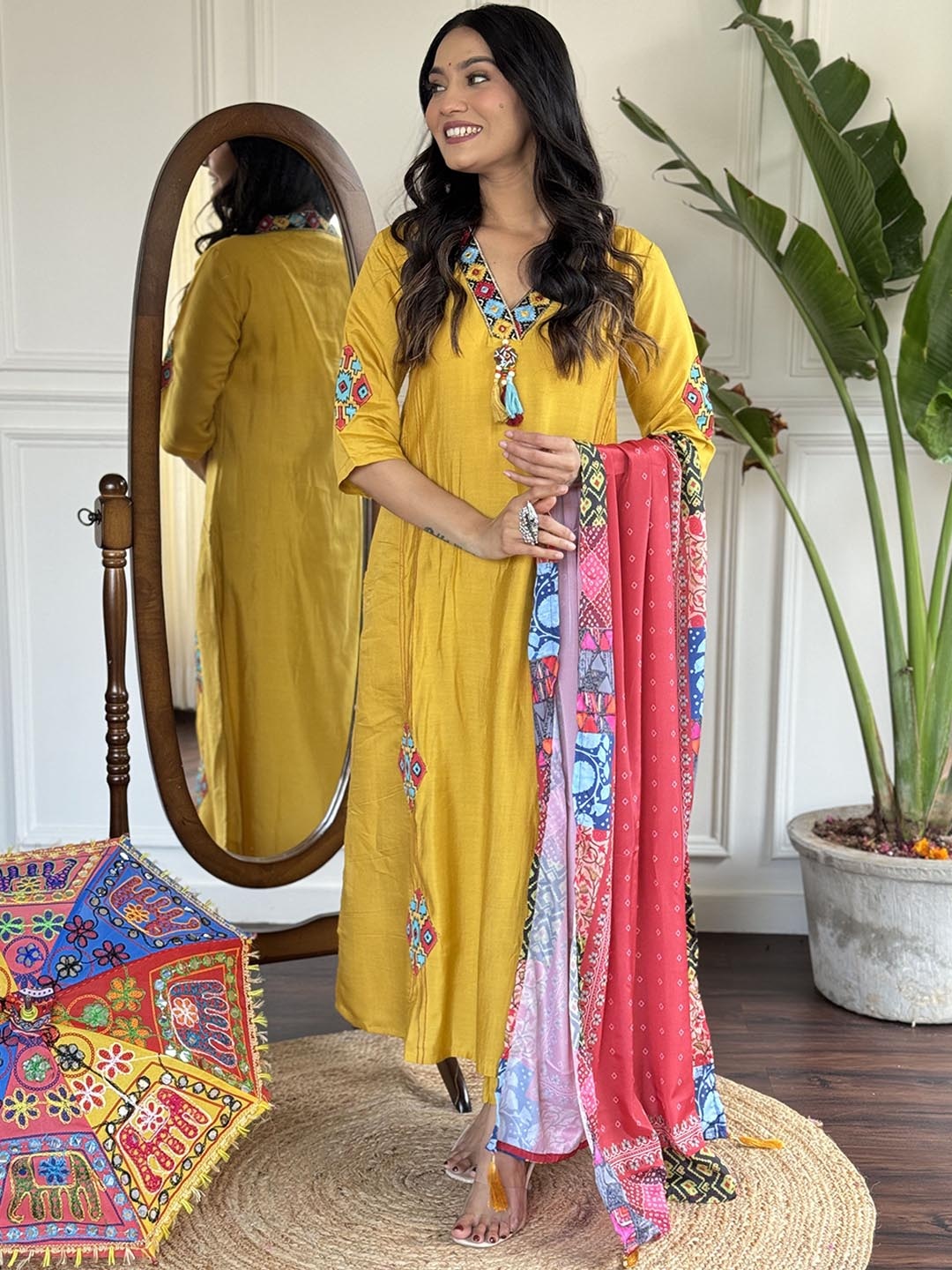 

KALINI Embroidered V-Neck Thread Work A-Line Kurta With Trousers & Dupatta, Mustard