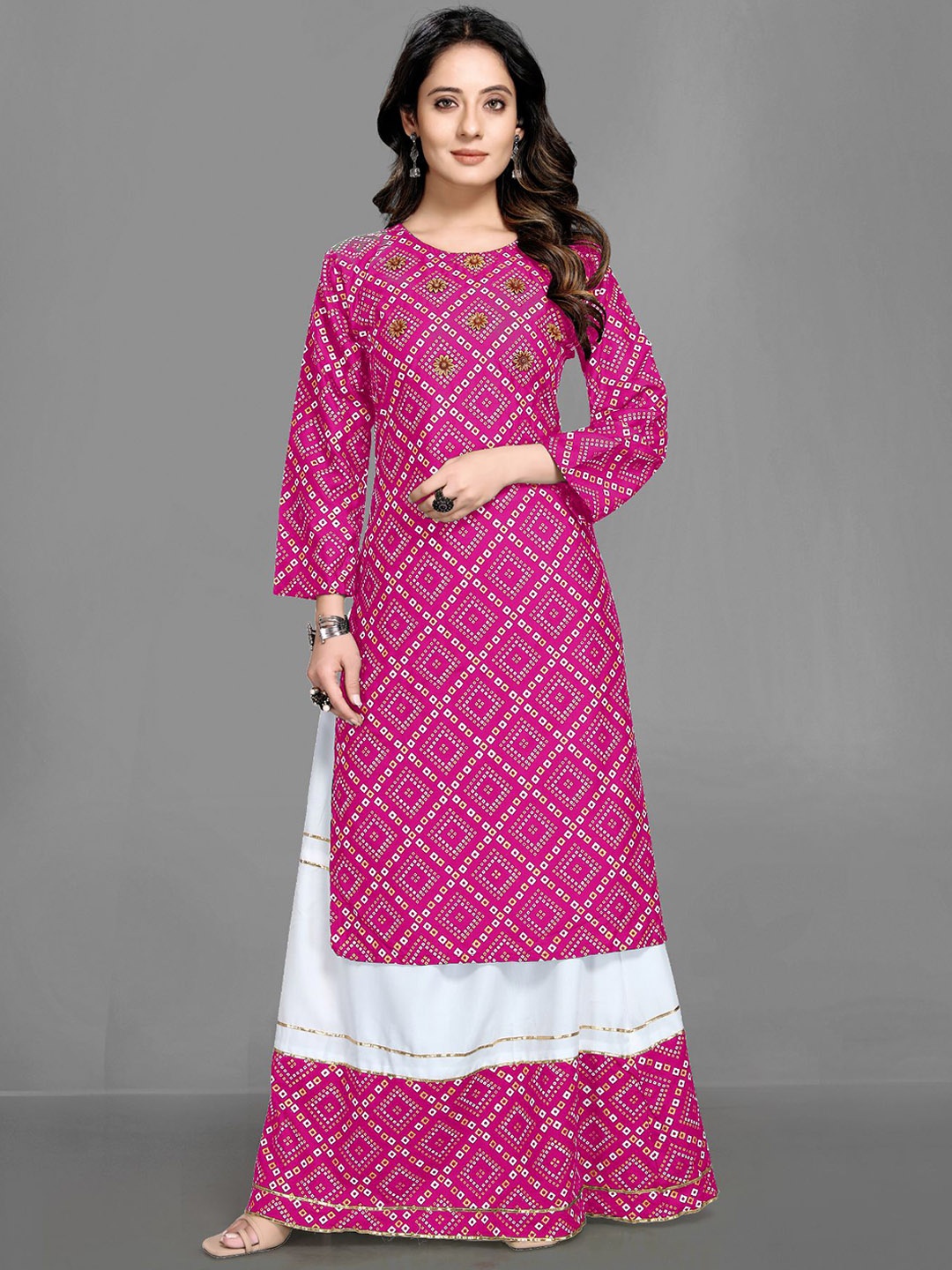 

Queenswear Creation Women Pink Ethnic Motifs Printed Beads and Stones Kurta with Skirt