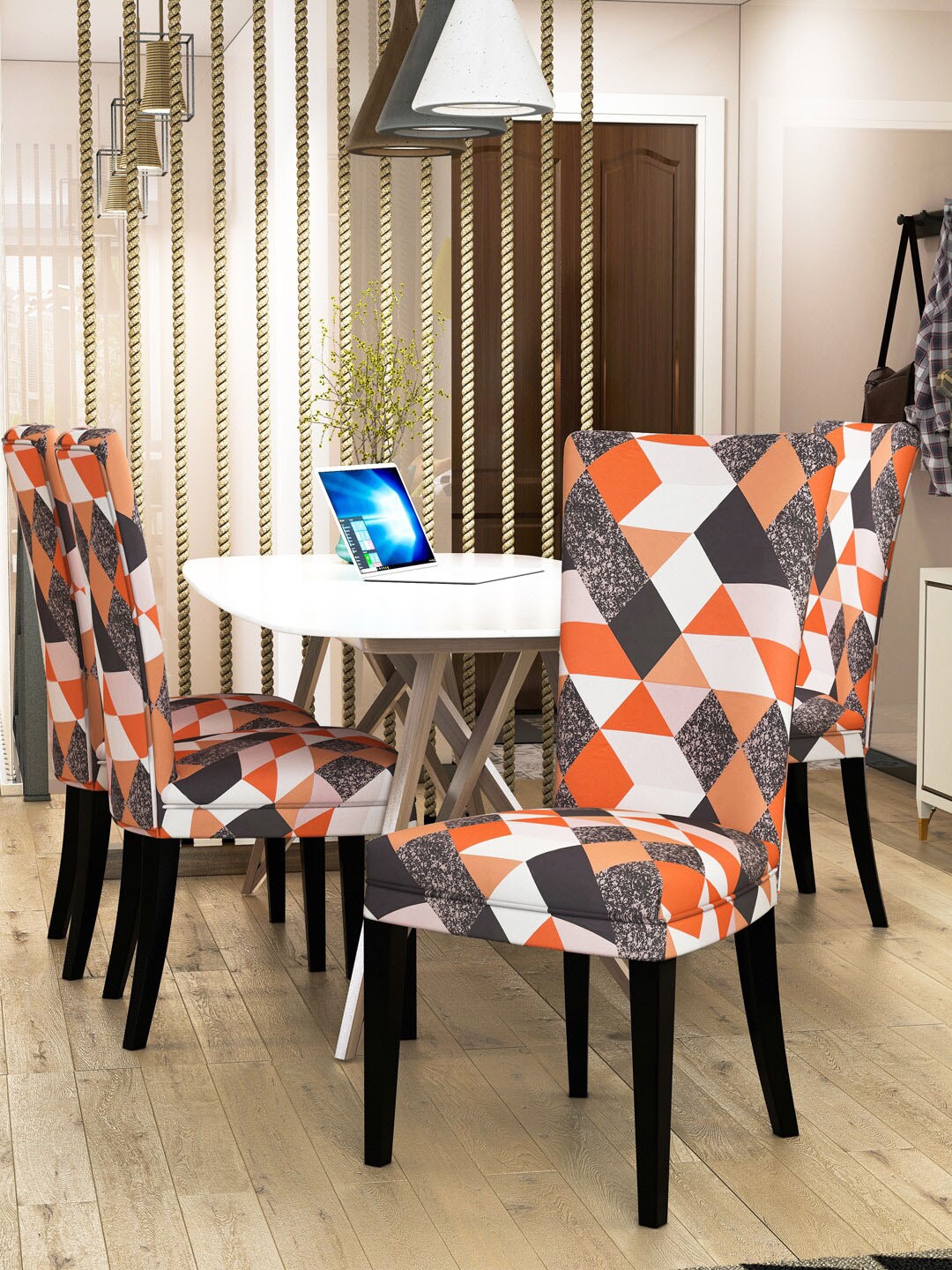 

Nendle Set of 4 Orange & Black Printed Stretchable Dining Table Chair Covers