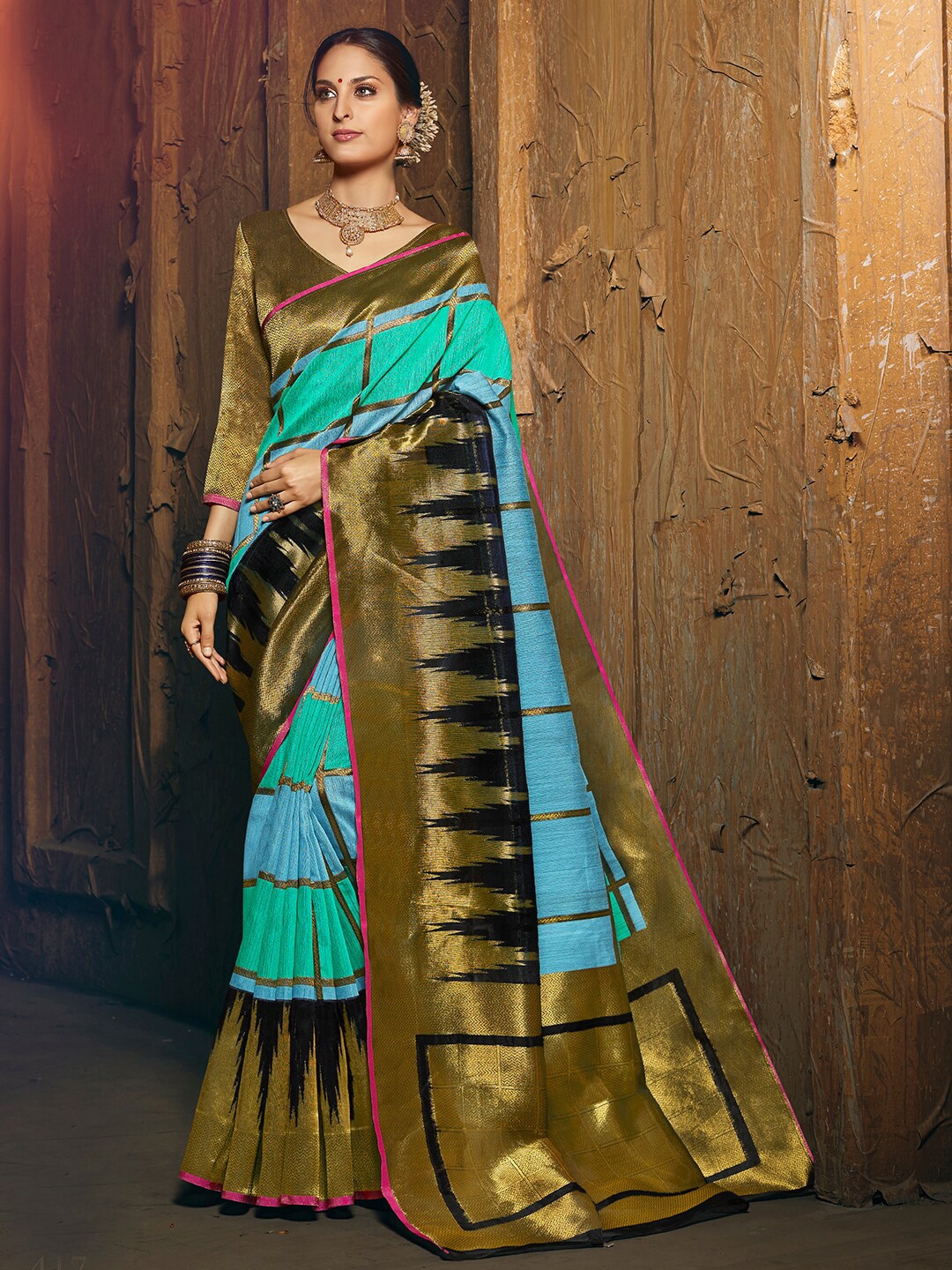 

Shaily Green & Gold-Toned Ethnic Motifs Zari Silk Cotton Banarasi Saree