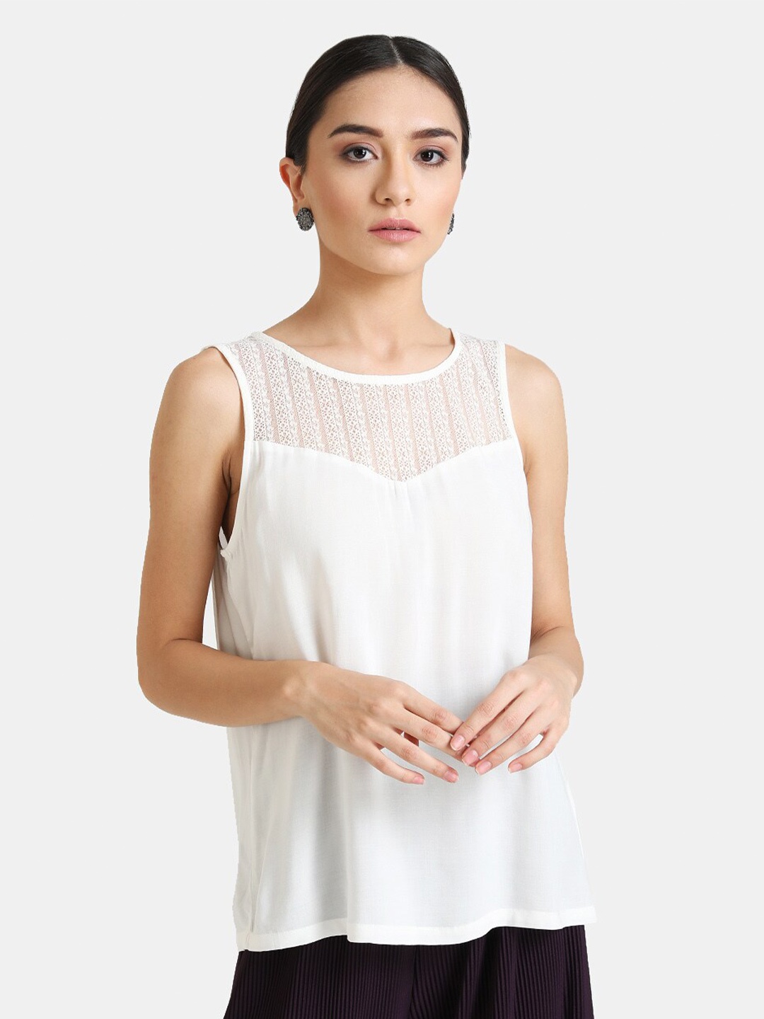 

Kazo White Solid Lace Up Top