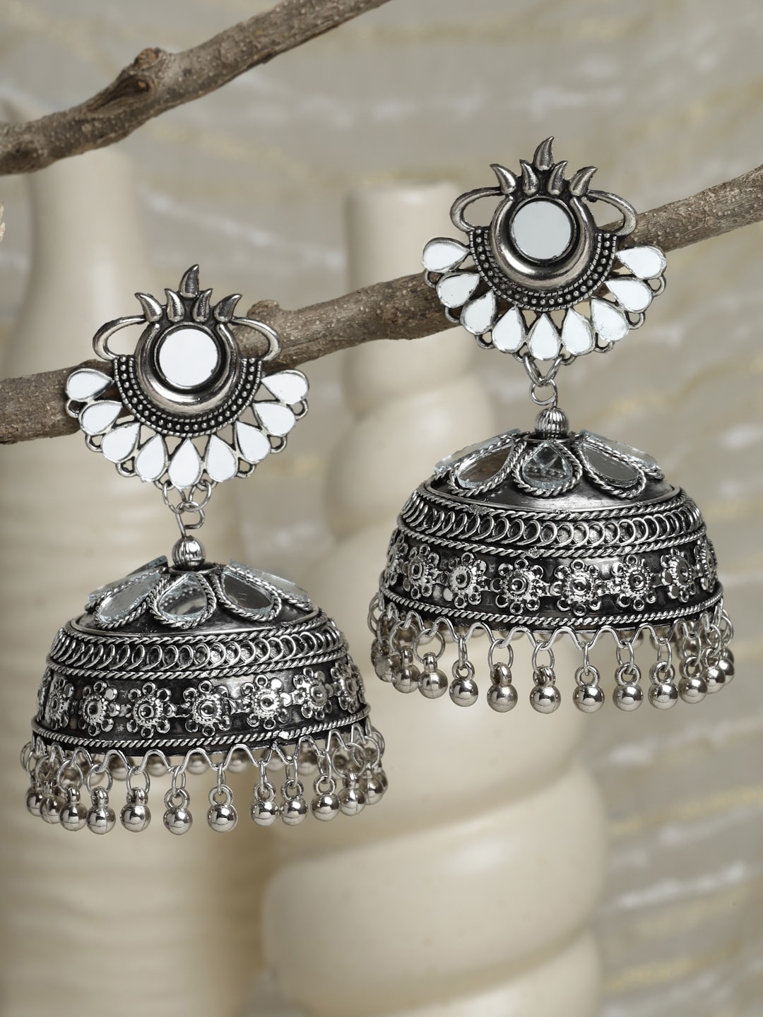

Moedbuille Silver-Toned Dome Shaped Jhumkas Earrings