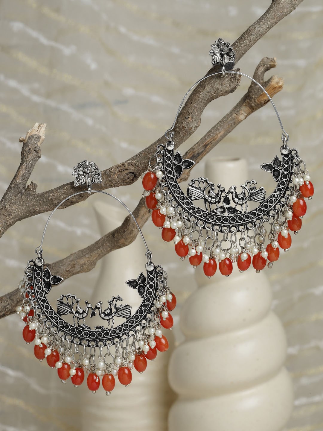 

Moedbuille Orange Oxidised Silver PlatedPeacock Shaped Chandbalis Earrings