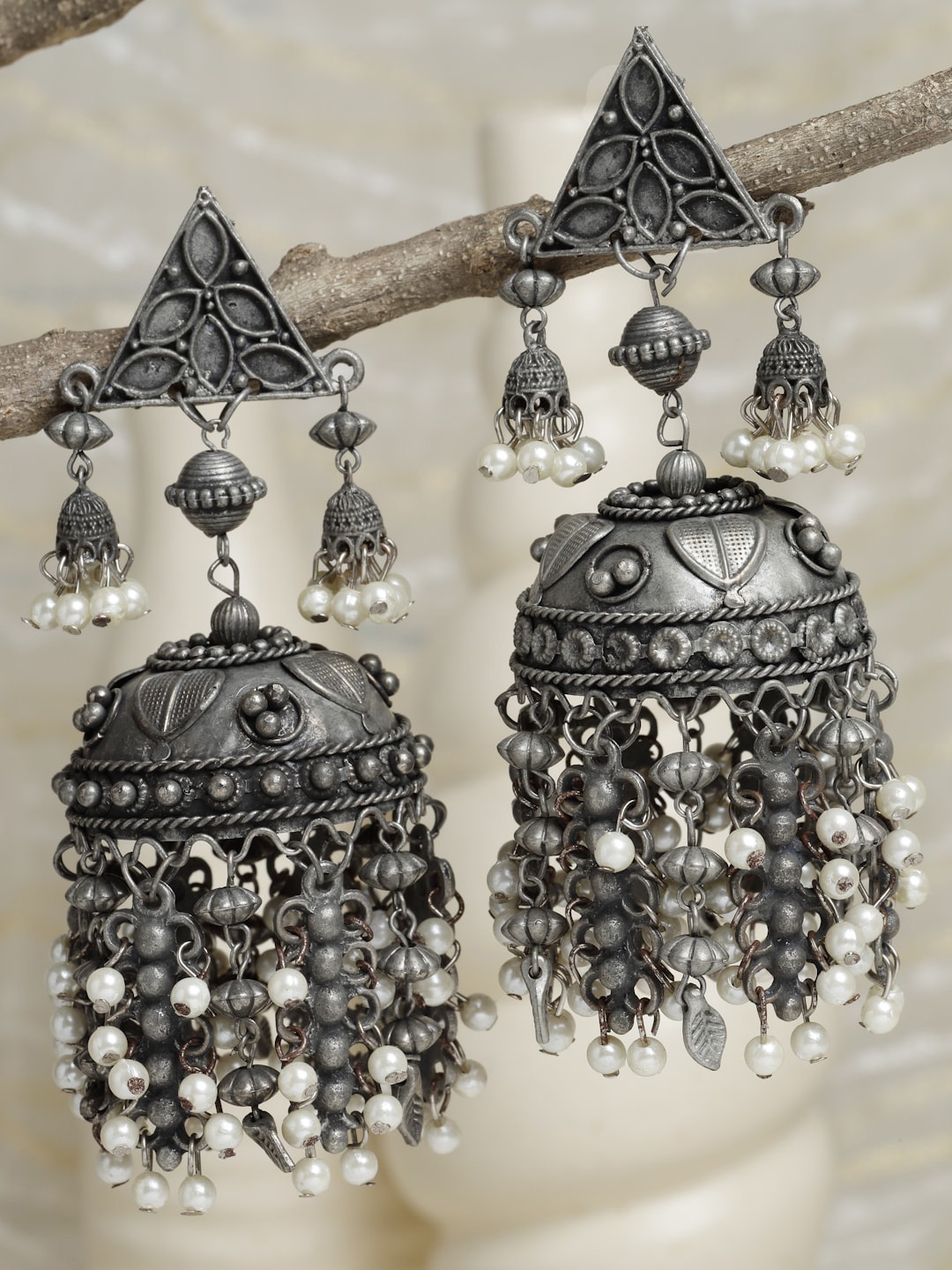 

Moedbuille Women Silver-Toned & White Dome Shaped Jhumkas Earrings