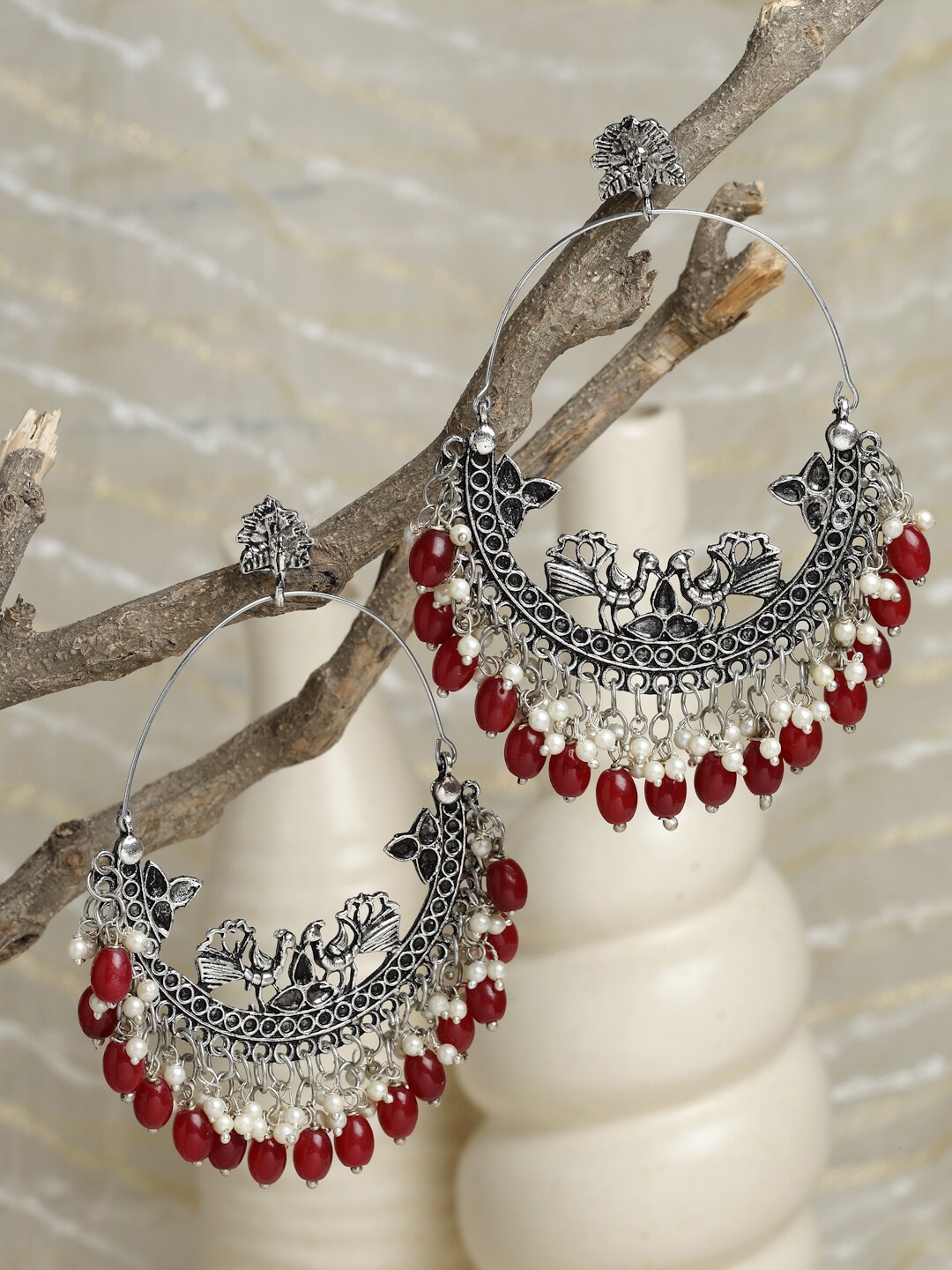 

Moedbuille Red Oxidised Crescent Shaped Chandbalis Earrings