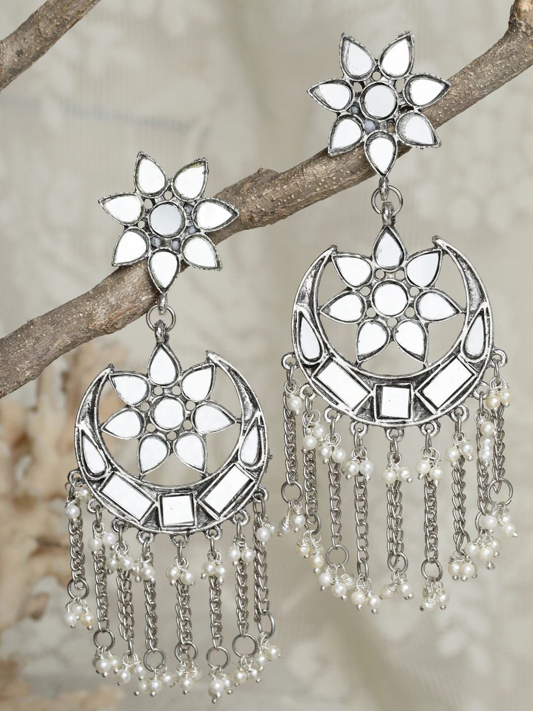 

Moedbuille Women Silver-Toned Crescent Shaped Chandbalis Earrings