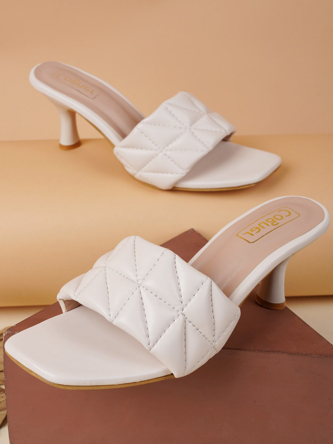 

Cogner Women White Textured Kitten Sandals