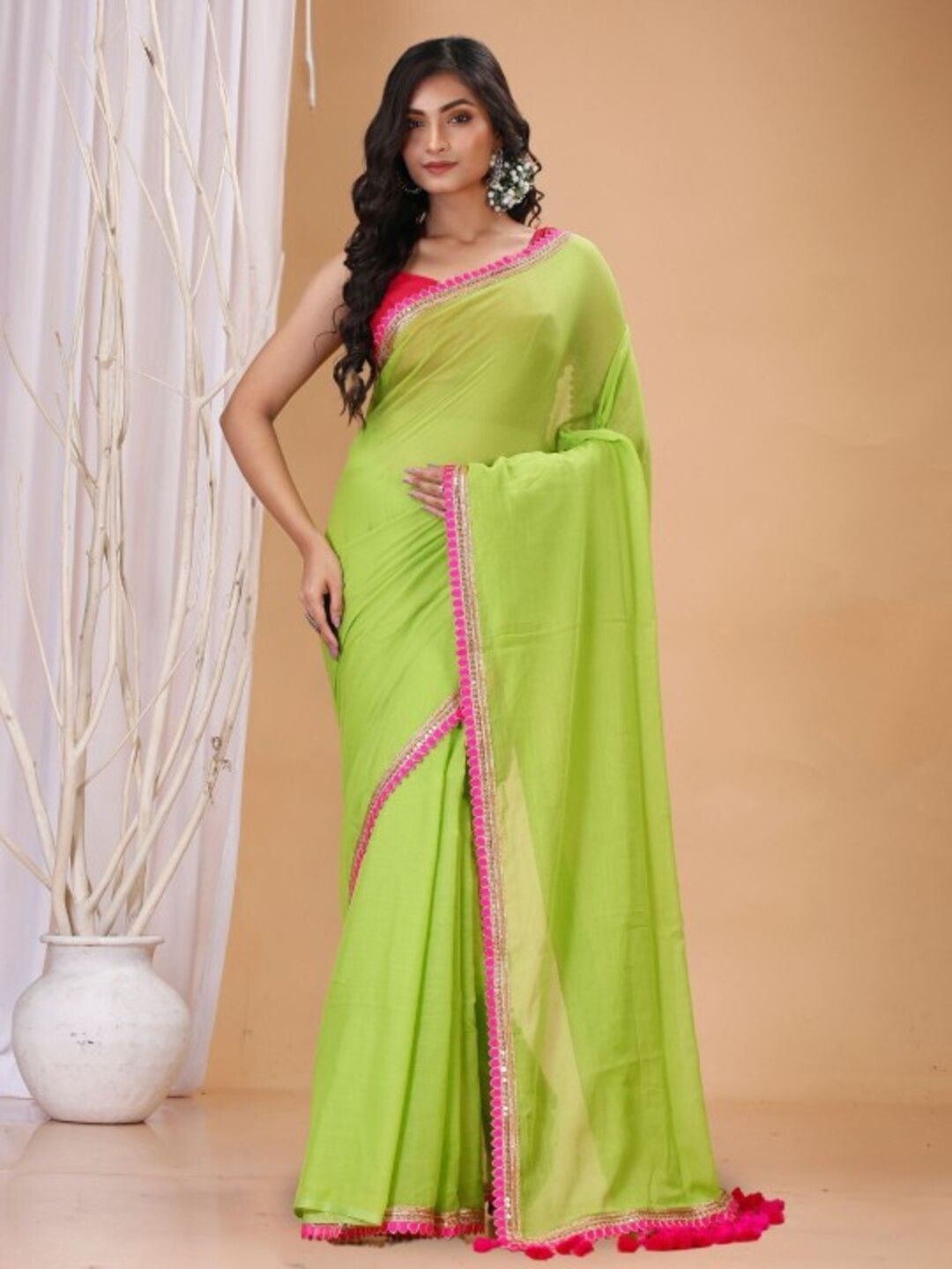 

VRAGI Embellished Embroidered Pure Georgette Saree, Green