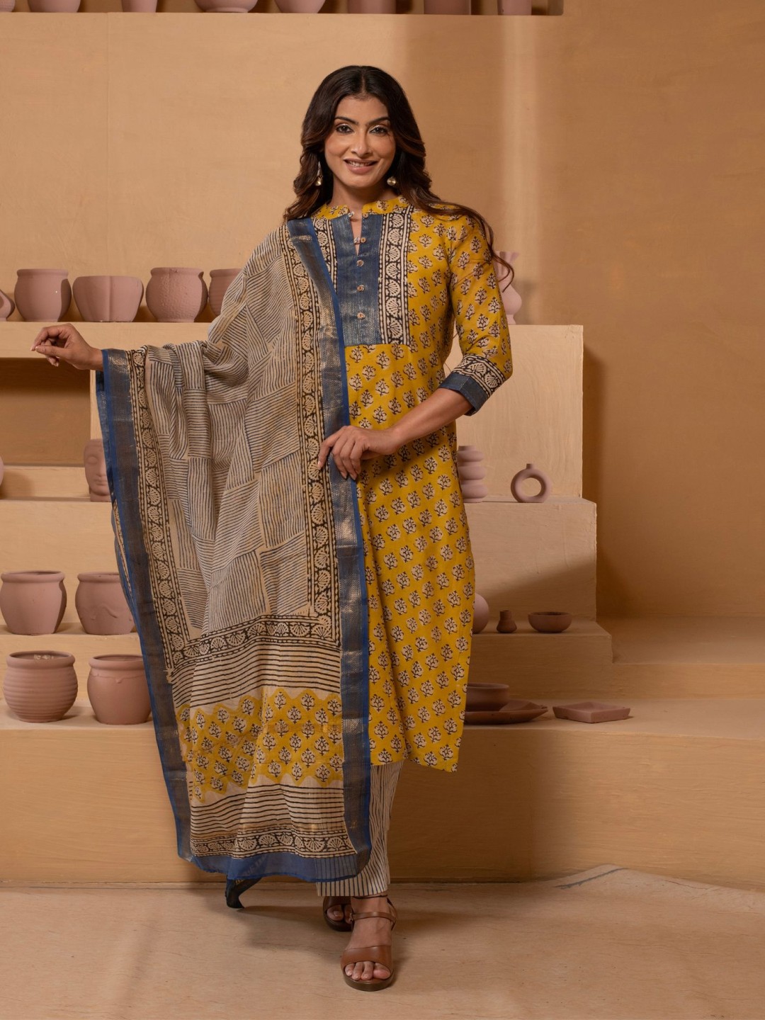 

Kasturi Creations Floral Printed Mandarin Collar Straight Kurta With Trouser And Dupatta, Mustard