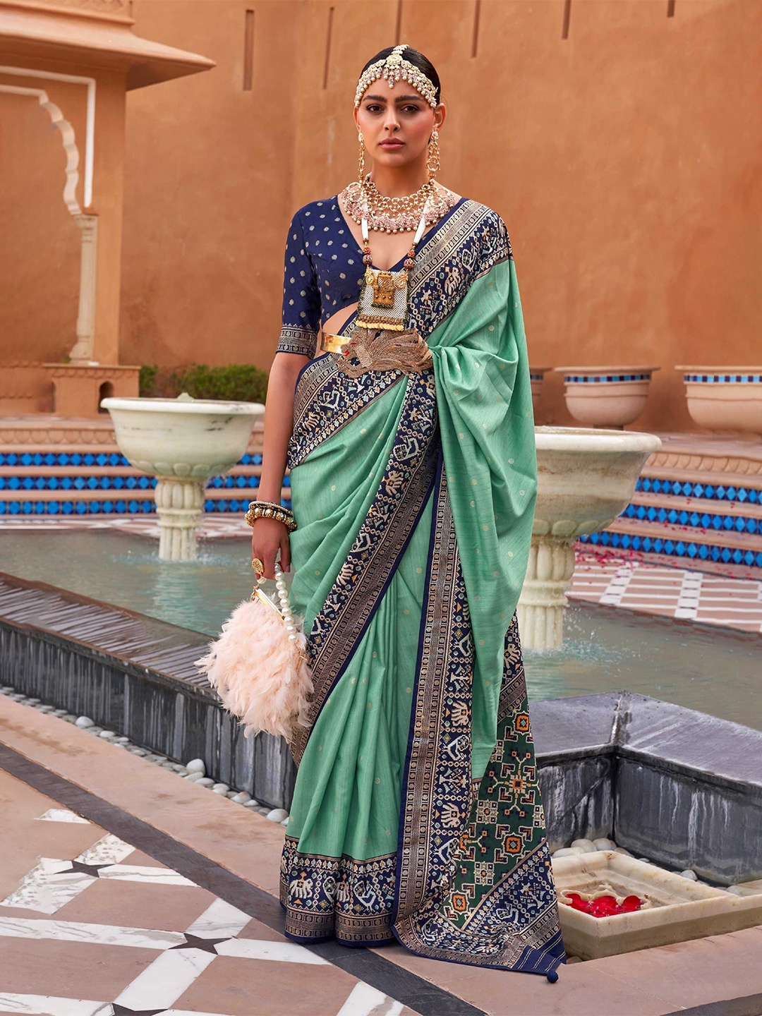 

DIVASTRI Woven Design Patola Saree, Sea green