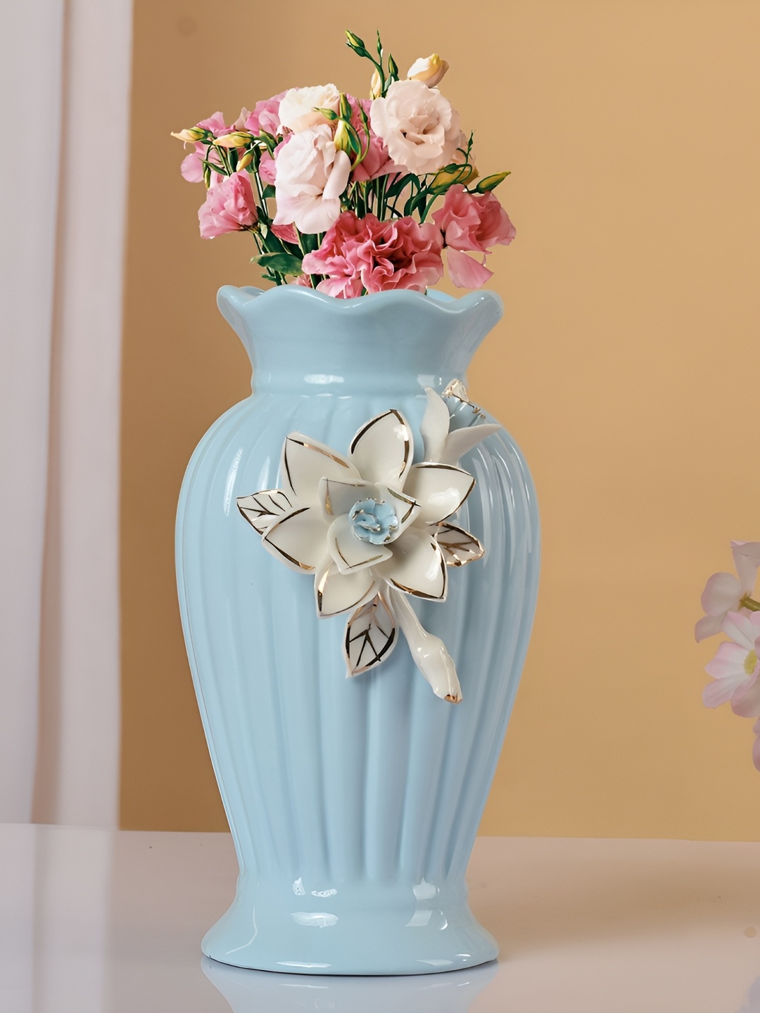 

Myntra Elegant Homes Blue And White Flower Blossom Ceramic Vase