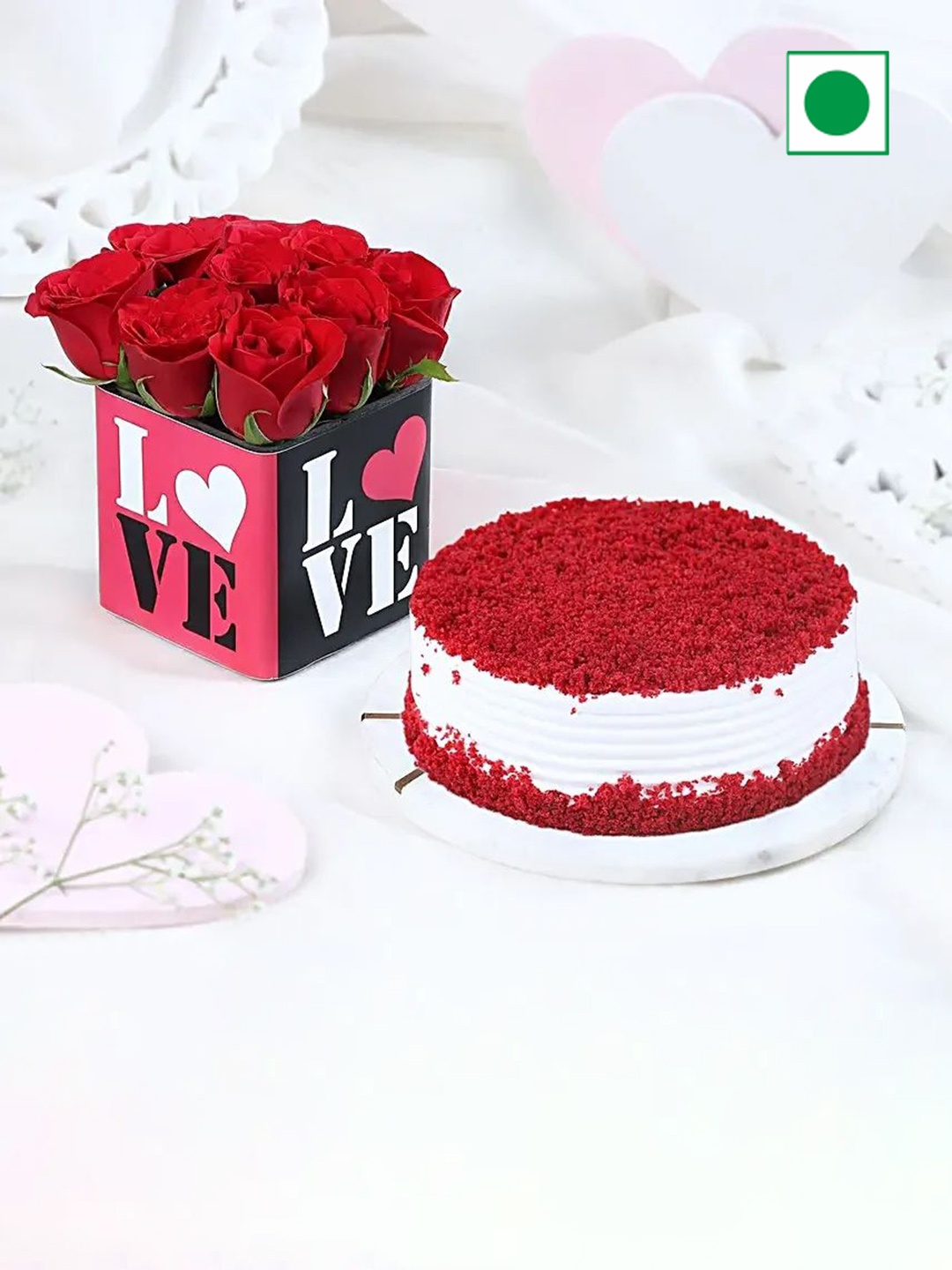 

fnp Red Velvet Flavour Eggless Round Shaped Valentines Cake-500g With Red Rose, White