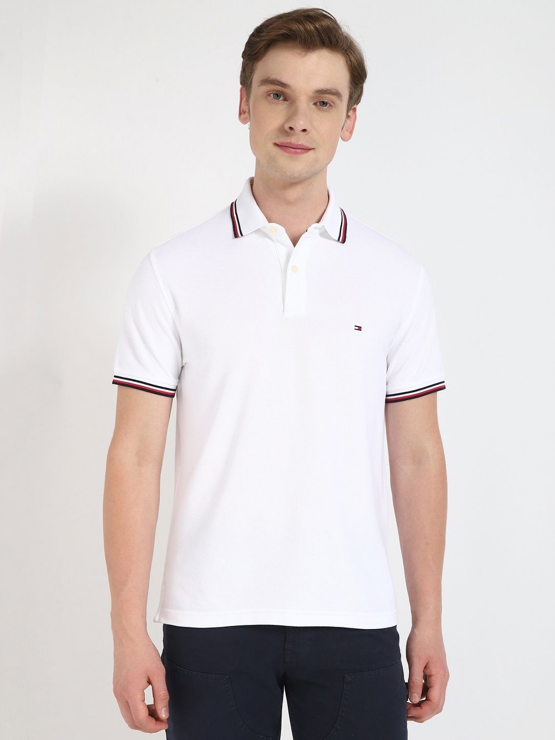 

Tommy Hilfiger Men Solid Polo Collar Cotton T-shirt, White
