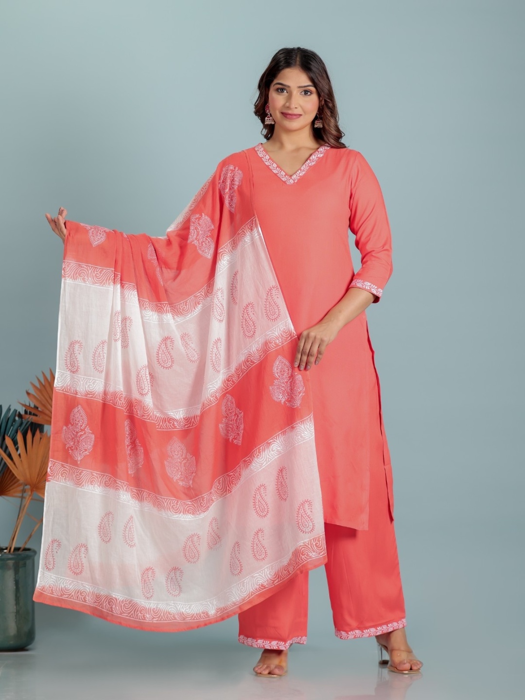 

Aramya Yoke Design Thread Work V-Neck Straight Kurta With Palazzos And Dupatta, Orange