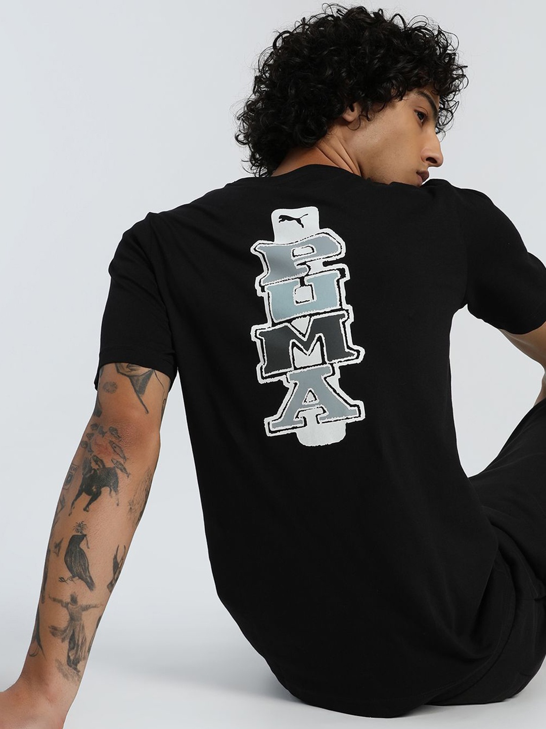 

Puma Men Graphics Printed Pure Cotton Short Sleeve T-Shirt, Black