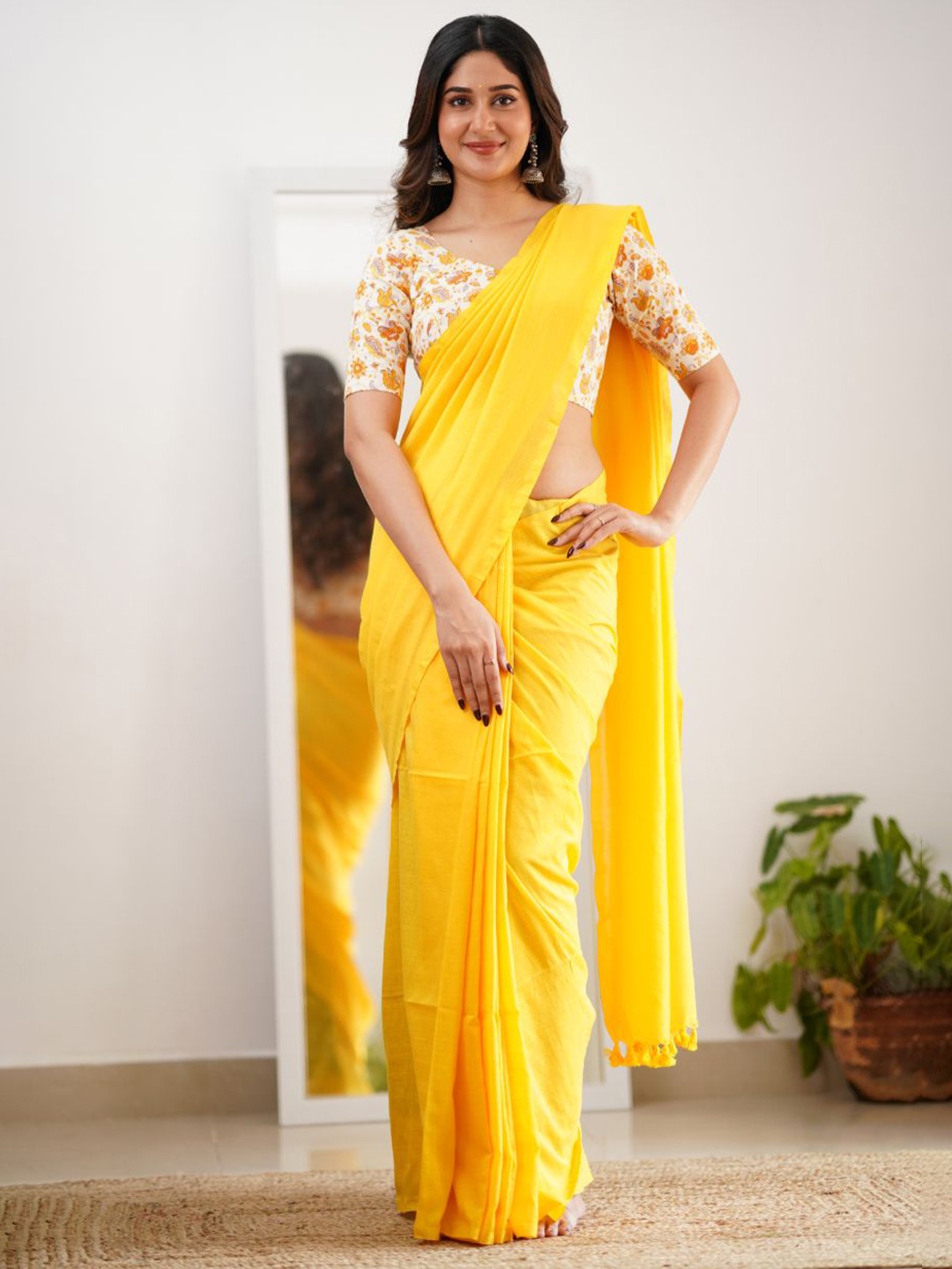 

Sutisancha Yellow Handloom Cotton Saree with Florance Blouse