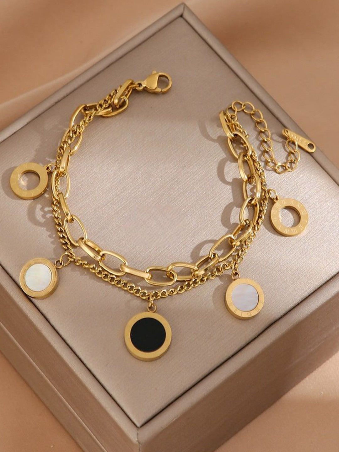 

Zabby Allen Roman Stainless Steel Gold-Plated Artificial Stones Studded Charm Bracelet
