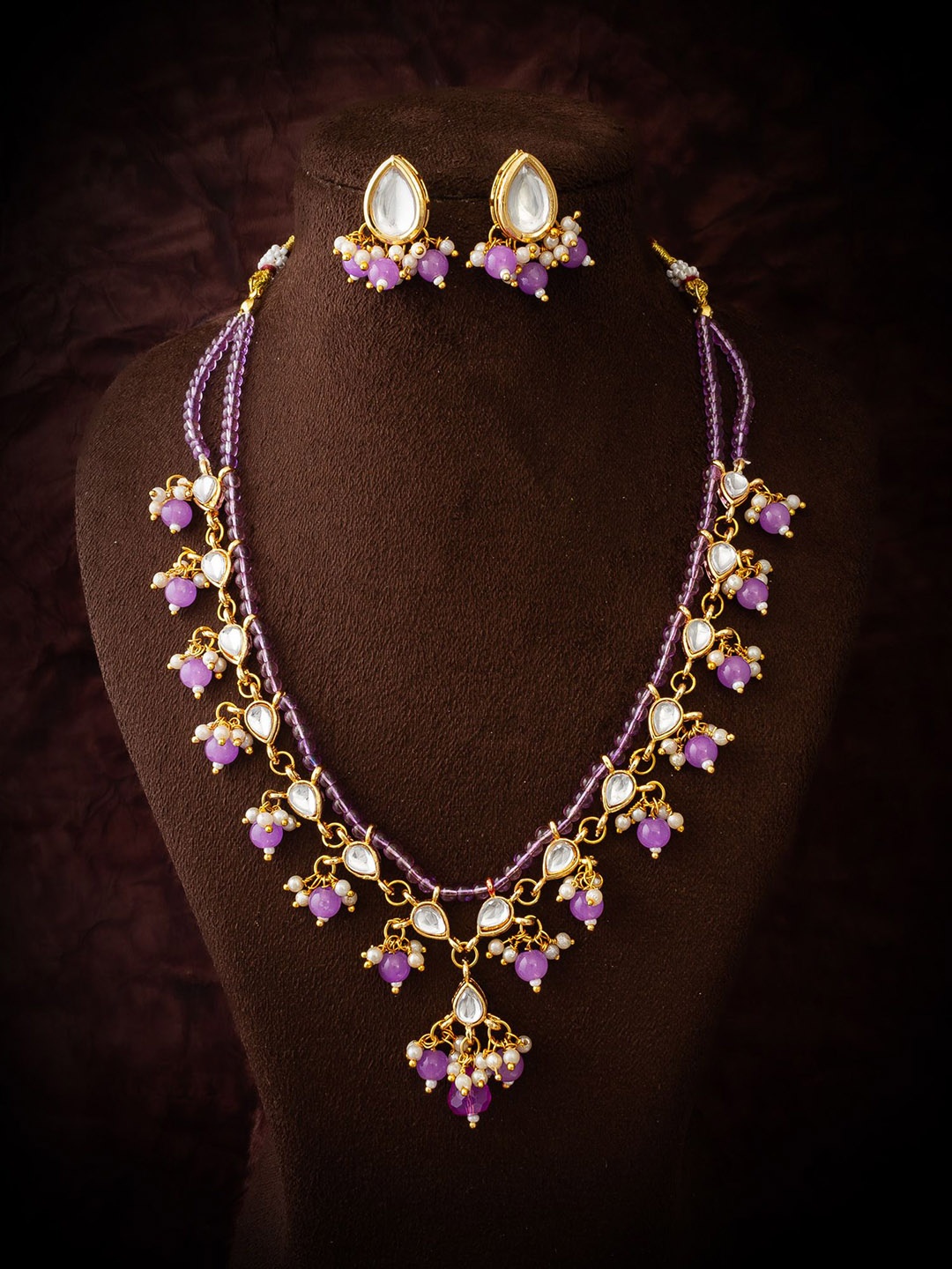 

Aadita Gold-Plated Stones-Studded & Beaded Jewellery Set