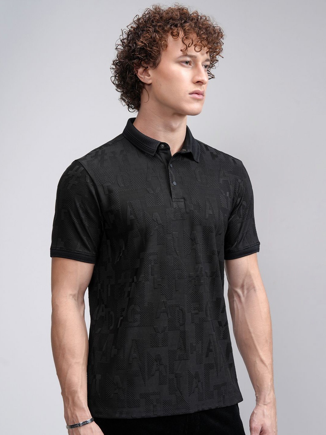

HIGHLANDER Men Self Design Regular Fit Polo T Shirt, Black