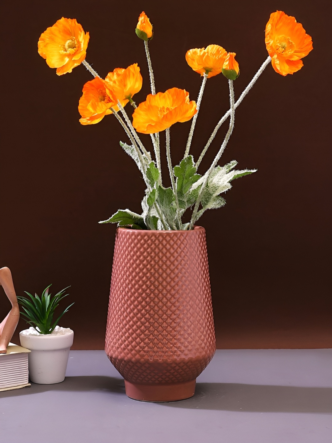 

Myntra Elegant Homes Peach Textured Cylindrical Ceramic Flower Vase