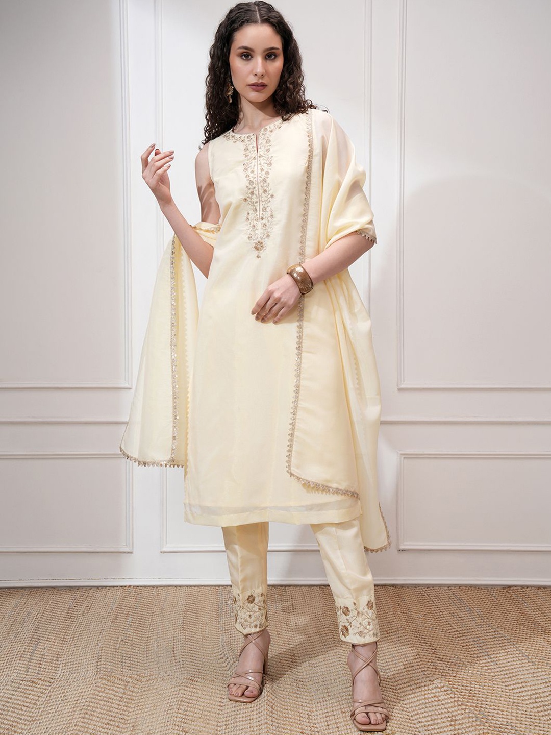 

Vishudh Women Embroidered Straight Sleeveless Kurta Set With Slim Pants & Tissue Dupatta, Cream