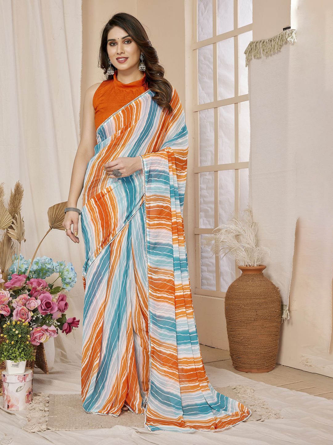 

DIVASTRI Striped Embroidered Pure Georgette Saree, Orange