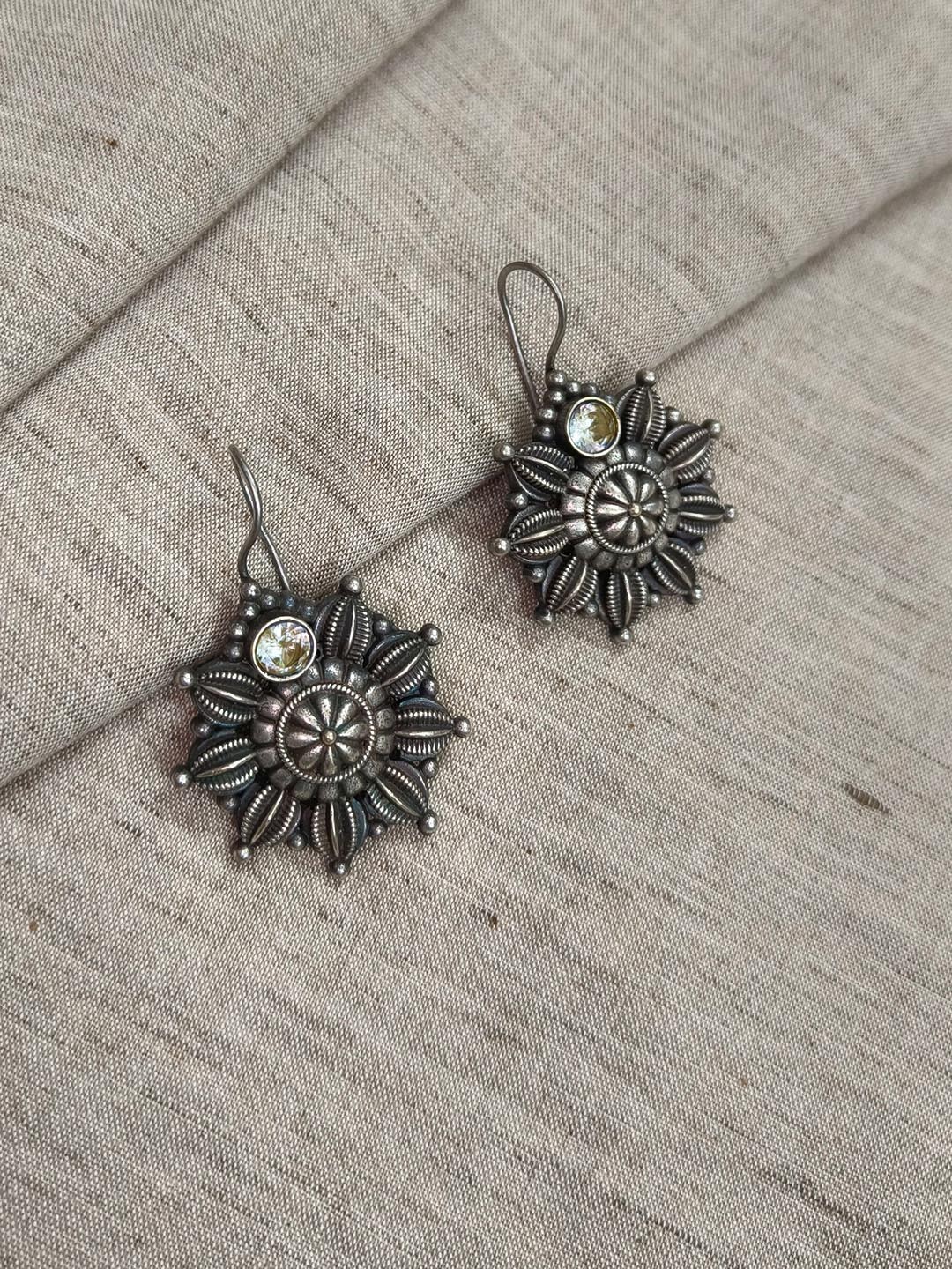 

Molcha Artificial Stones Studded Floral Shaped Oxidised Drop Earrings, Silver